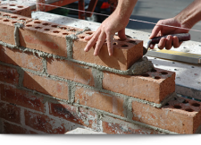 Bricklayer for building a wall